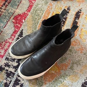 Black Nike slip on high tops